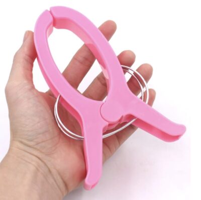 Pink Quilting Clamp in a Hand