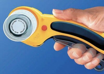 Olfa Ergonomic 45mm Rotary Cutter - Held in Hand