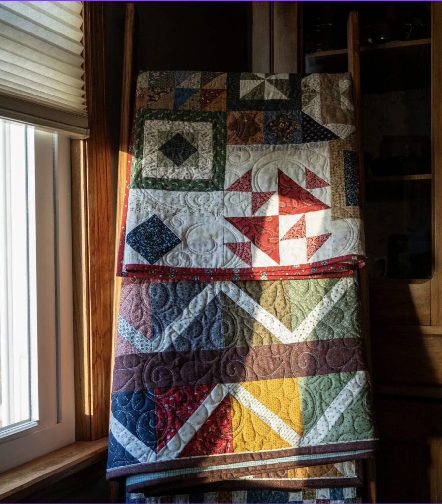 Displaying Quilts on a Quilt Ladded
