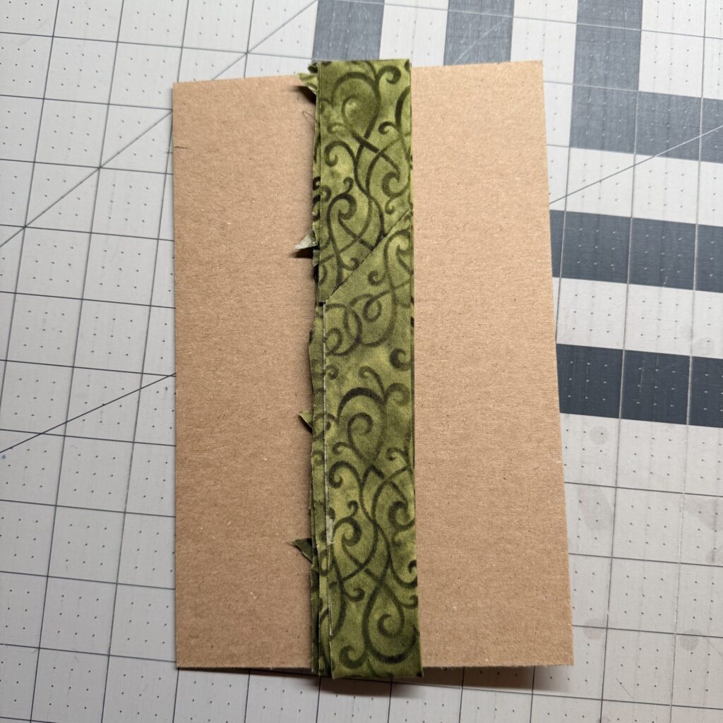 Quilting Tools - Binding wound around scrap chipboard